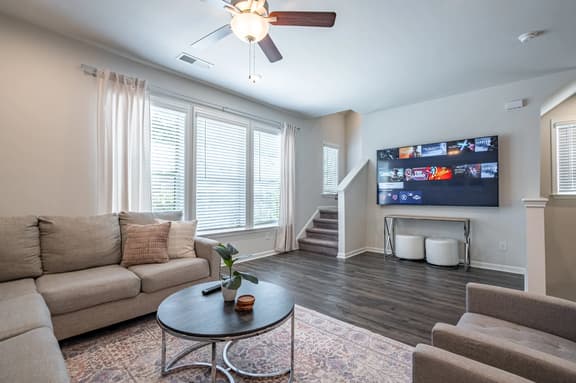 3-Story Pet-Friendly Retreat with Private Suites - Image 1